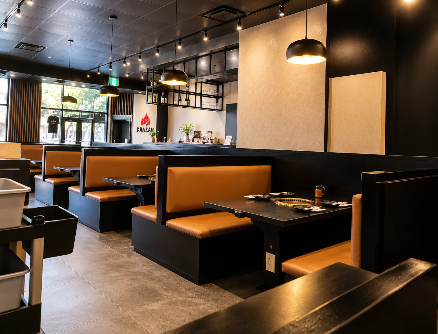 Dining room with booths and tabletop grills