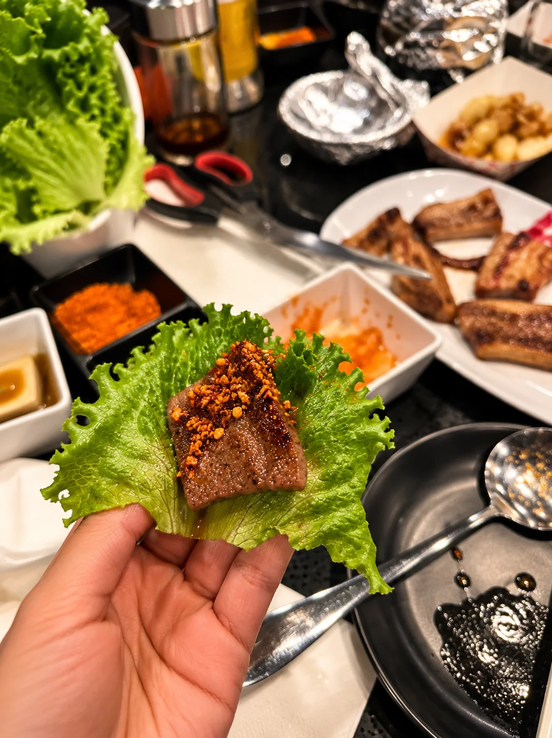Grilled meat in a fresh lettuce wrap