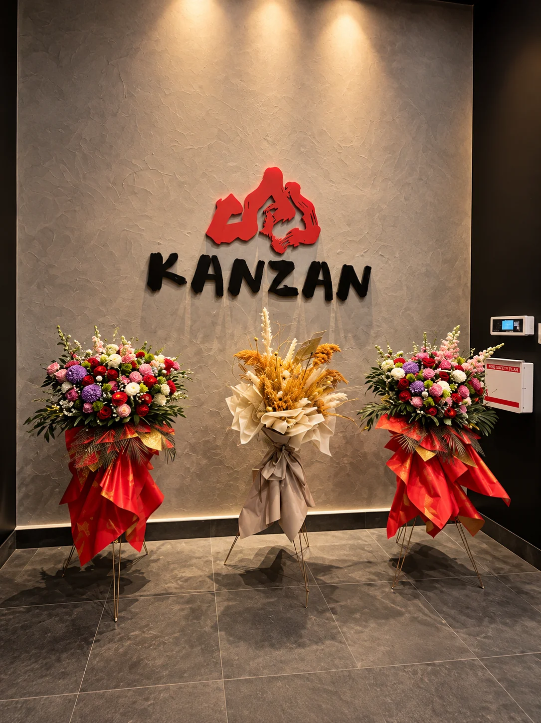 Kanzan welcome wall with floral arrangements